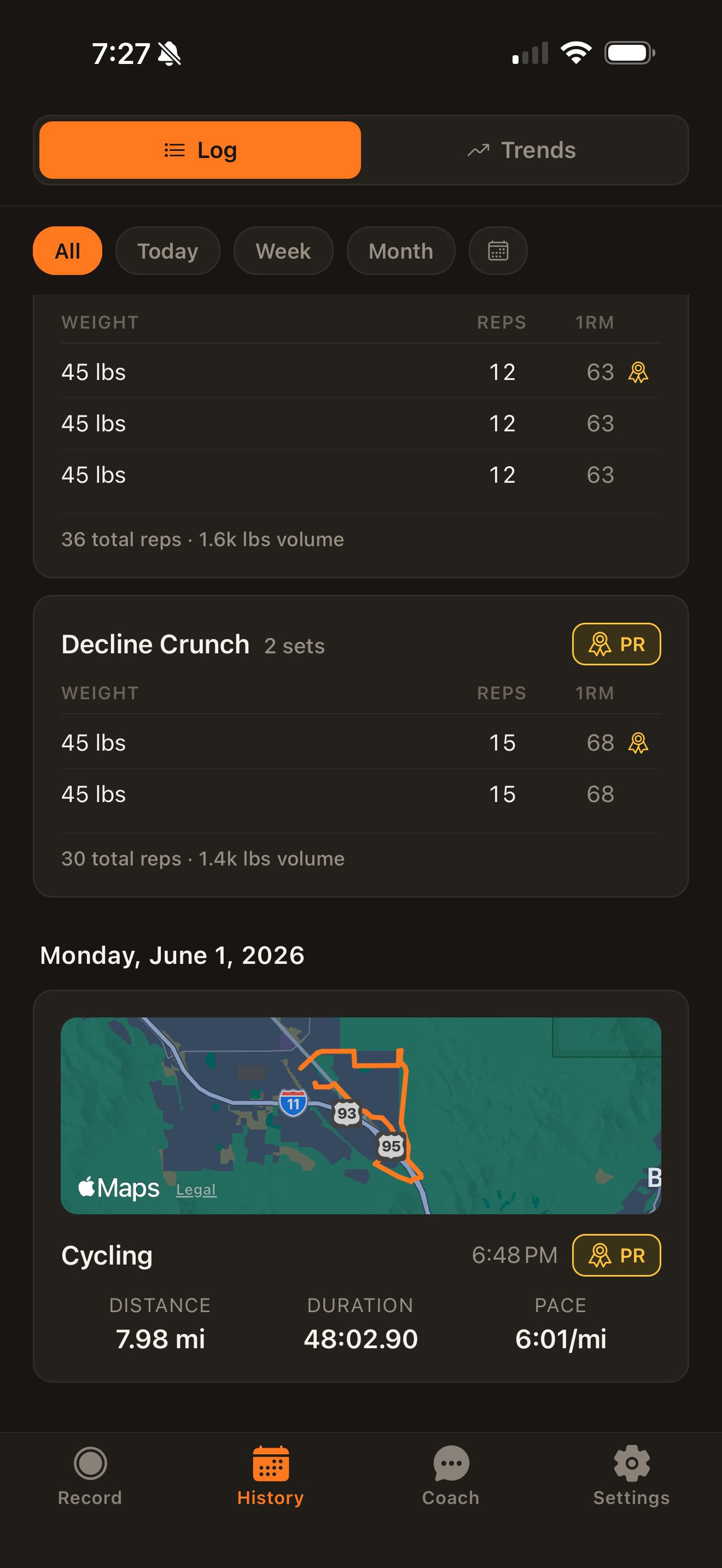 Workout log showing each set's estimated 1RM and automatic personal-record detection